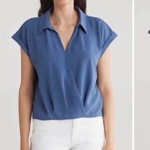 Pleione Blue Wrap Blouse with Notched Collar and Cuffed Cap Sleeves